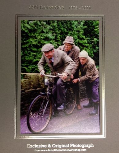 Clegg on Bike with Seymour & Compo Pushing Bike Photo